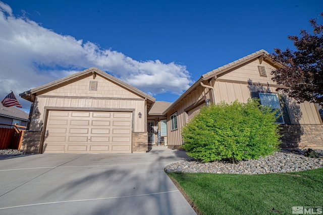 6680 Voyage Dr, Sparks, NV 89436 - single story home featuring driveway, an attached garage, and board and batten siding