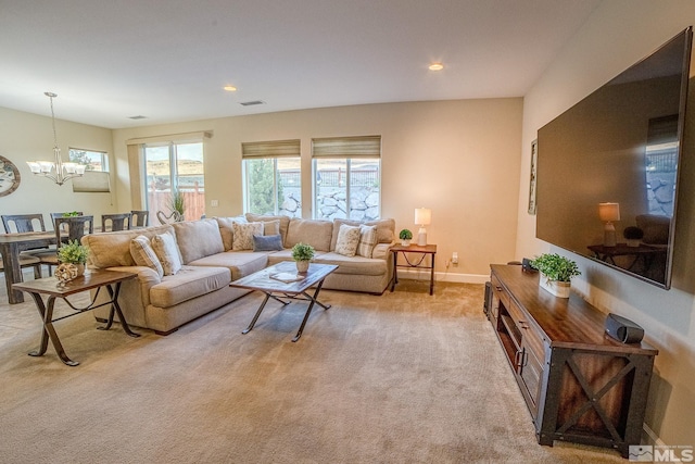 6680 Voyage Dr, Sparks, NV 89436 - living room with a chandelier, light colored carpet, recessed lighting, and baseboards