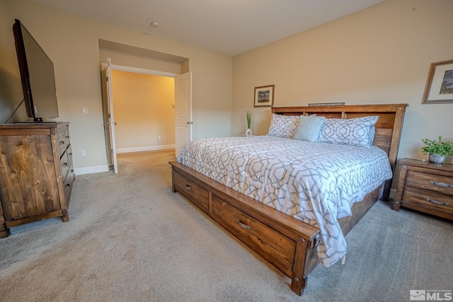6680 Voyage Dr, Sparks, NV 89436 - bedroom with light colored carpet and baseboards