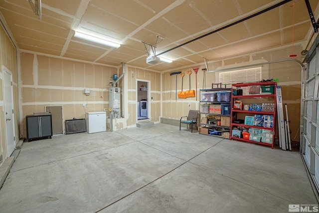 6680 Voyage Dr, Sparks, NV 89436 - garage with gas water heater and a garage door opener