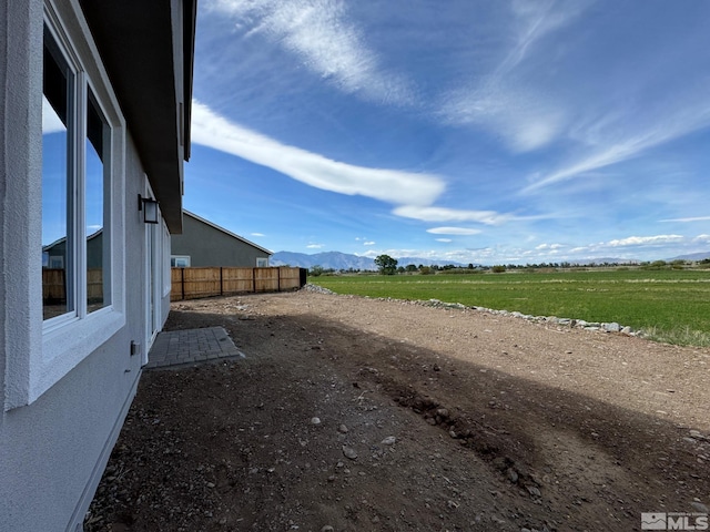 620 Sage Grouse Loop, Gardnerville, NV 89460 - view of yard featuring a mountain view and fence