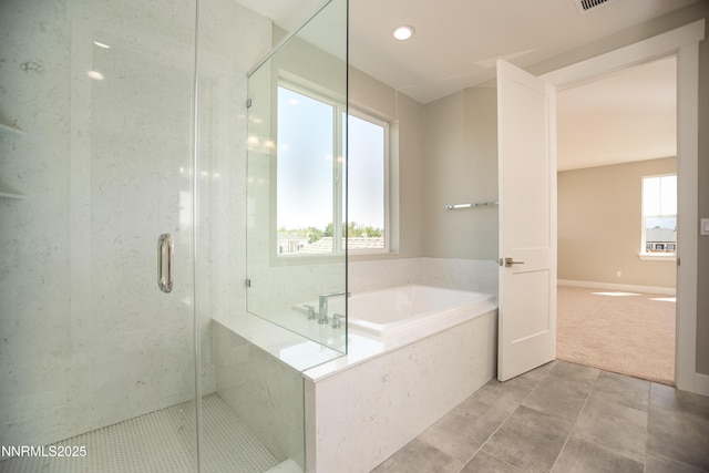 620 Sage Grouse Lp, Gardnerville, NV 89460 - bathroom featuring a bath, a stall shower, and tile patterned flooring