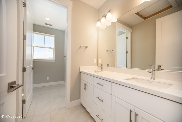 620 Sage Grouse Lp, Gardnerville, NV 89460 - bathroom with double vanity, baseboards, and tile patterned flooring