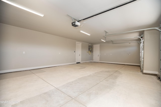 620 Sage Grouse Lp, Gardnerville, NV 89460 - garage featuring water heater, a garage door opener, and baseboards