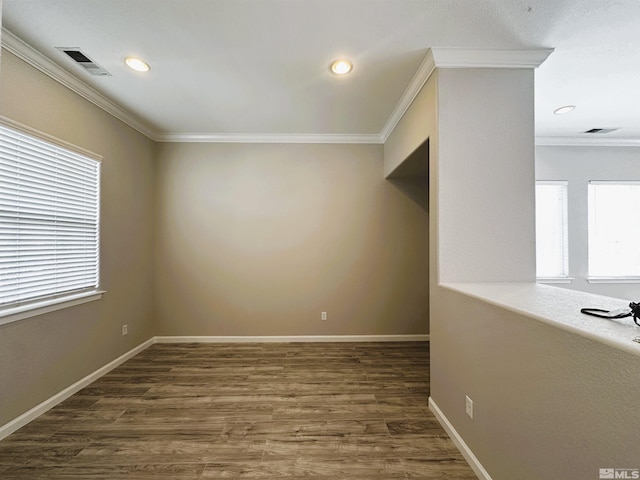 10599 Crystal Bay Dr, Reno, NV 89521 - unfurnished room with ornamental molding, wood finished floors, recessed lighting, and baseboards