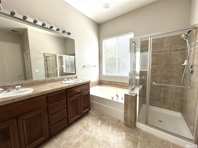 10599 Crystal Bay Dr, Reno, NV 89521 - bathroom featuring a stall shower, a garden tub, and double vanity