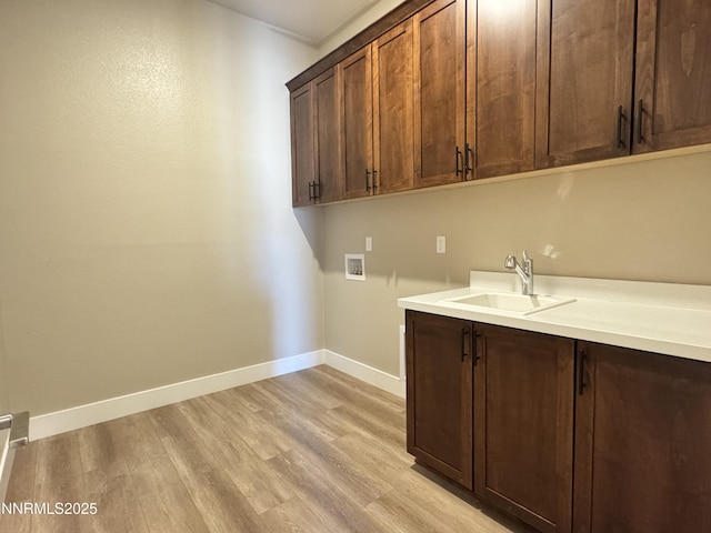 638 Sage Grouse Lp, Gardnerville, NV 89460 - laundry area with cabinet space, washer hookup, and light wood-type flooring