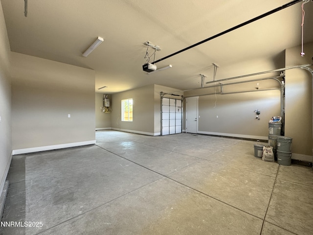 638 Sage Grouse Lp, Gardnerville, NV 89460 - garage featuring baseboards and a garage door opener