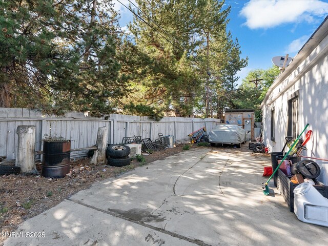 665 Southworth Dr, Reno, NV 89512 - fenced backyard featuring a patio