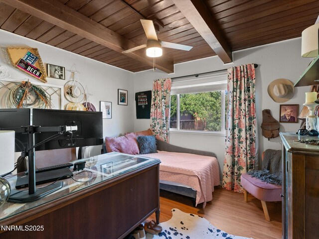 665 Southworth Dr, Reno, NV 89512 - bedroom with wooden ceiling with exposed beams, wood finished floors, and a desk