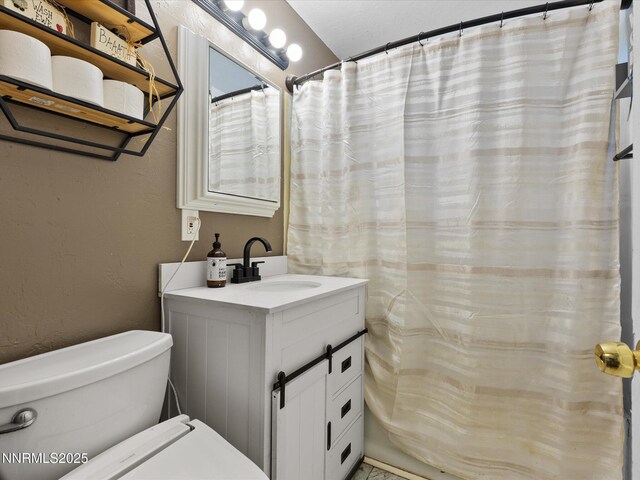 665 Southworth Dr, Reno, NV 89512 - full bathroom featuring vanity, toilet, a textured wall, and curtained shower