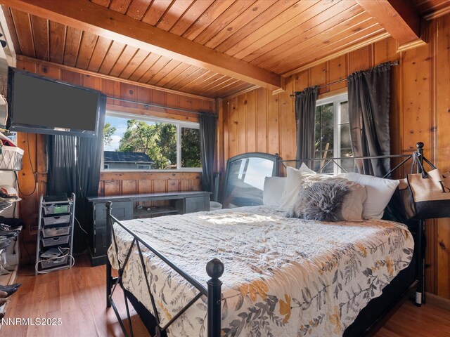 665 Southworth Dr, Reno, NV 89512 - bedroom featuring wooden ceiling with exposed beams, wood walls, and wood finished floors