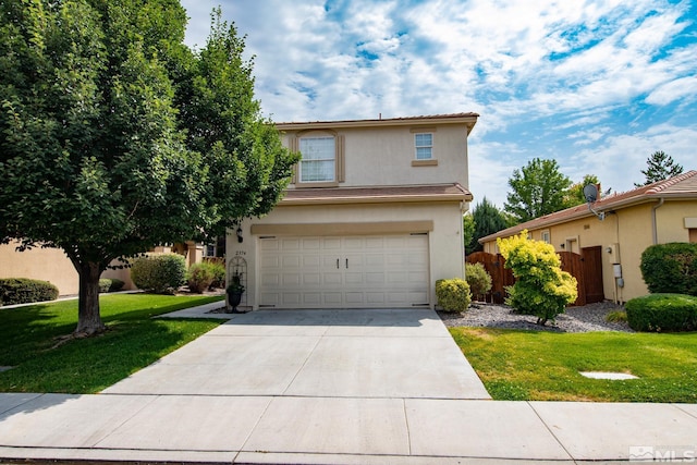 2374 Roman Dr, Sparks, NV 89434 - traditional home with stucco siding, driveway, and a garage