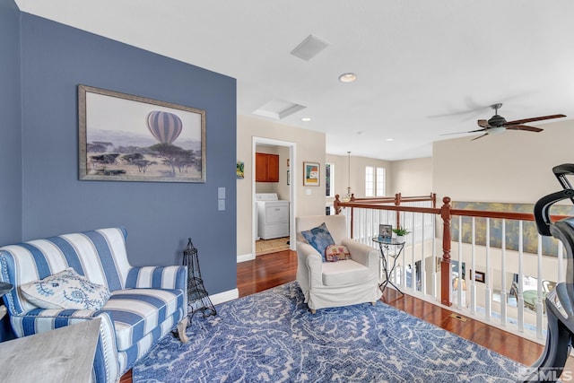 2374 Roman Dr, Sparks, NV 89434 - sitting room featuring washer / clothes dryer, wood finished floors, ceiling fan, baseboards, and recessed lighting