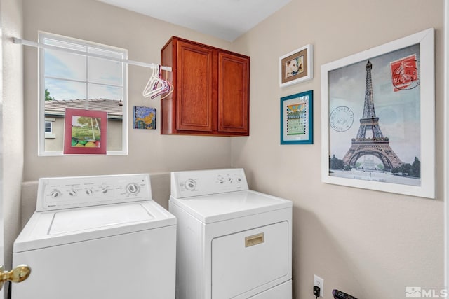 2374 Roman Dr, Sparks, NV 89434 - washroom featuring cabinet space and washing machine and clothes dryer