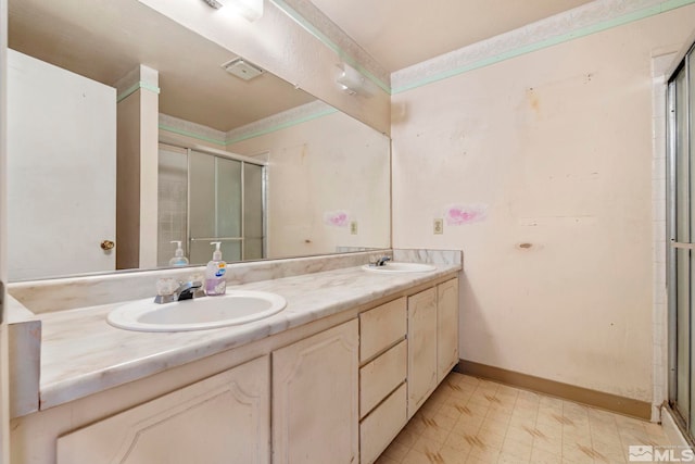 966 Woodstone Dr, Sparks, NV 89434 - bathroom featuring double vanity, a shower stall, and baseboards
