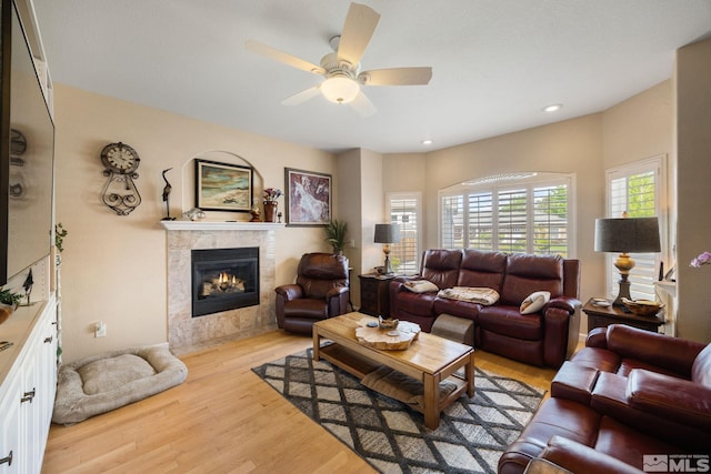 6525 Monticello Ct, Reno, NV 89519 - living area featuring a fireplace, light wood finished floors, ceiling fan, and recessed lighting