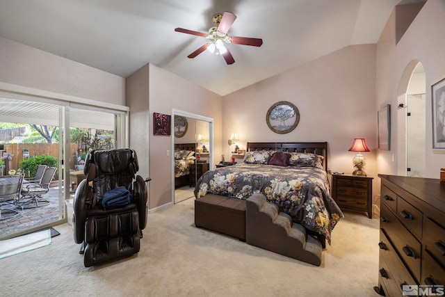 6525 Monticello Ct, Reno, NV 89519 - bedroom featuring access to outside, arched walkways, light carpet, high vaulted ceiling, and ceiling fan