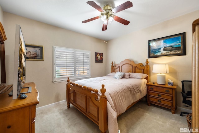 6525 Monticello Ct, Reno, NV 89519 - bedroom featuring light carpet, baseboards, and a ceiling fan