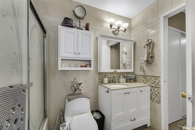 1064 Bradley Sq, Sparks, NV 89434 - full bathroom featuring tile walls, vanity, and toilet