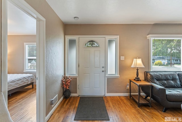 2066 Plumas St, Reno, NV 89509 - foyer entrance with hardwood / wood-style flooring, healthy amount of natural light, and baseboards