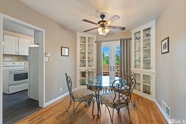 2066 Plumas St, Reno, NV 89509 - dining area with ceiling fan, french doors, wood finished floors, and baseboards