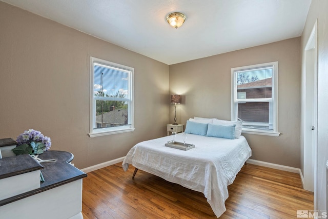 2066 Plumas St, Reno, NV 89509 - bedroom featuring light wood-style floors and baseboards