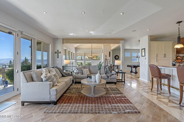10286 Morning Song Trl, Reno, NV 89511 - living room featuring recessed lighting, a chandelier, wood finish floors, and baseboards