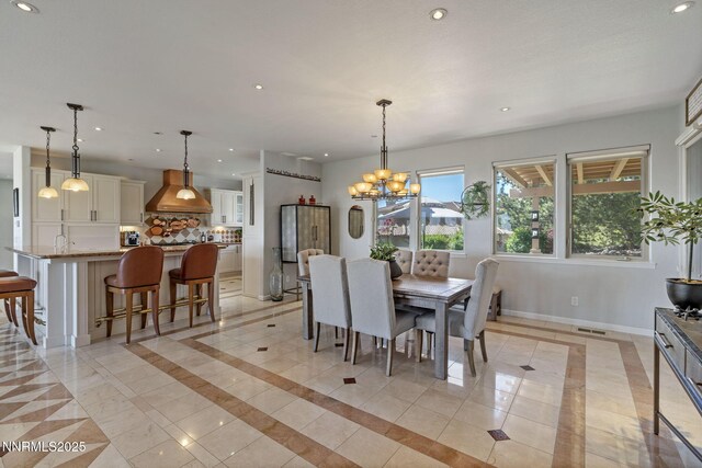10286 Morning Song Trl, Reno, NV 89511 - dining room featuring recessed lighting, a chandelier, baseboards, and inlaid floor details