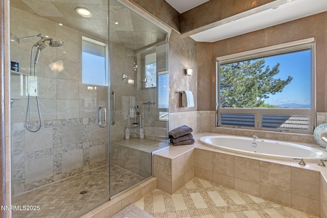 10286 Morning Song Trl, Reno, NV 89511 - full bathroom with plenty of natural light, a stall shower, a bath, and tile patterned flooring