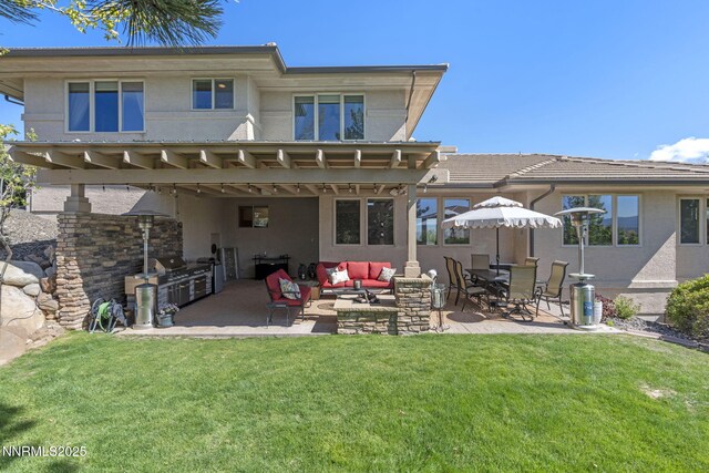 10286 Morning Song Trl, Reno, NV 89511 - back of property with an outdoor hangout area, a yard, and a patio