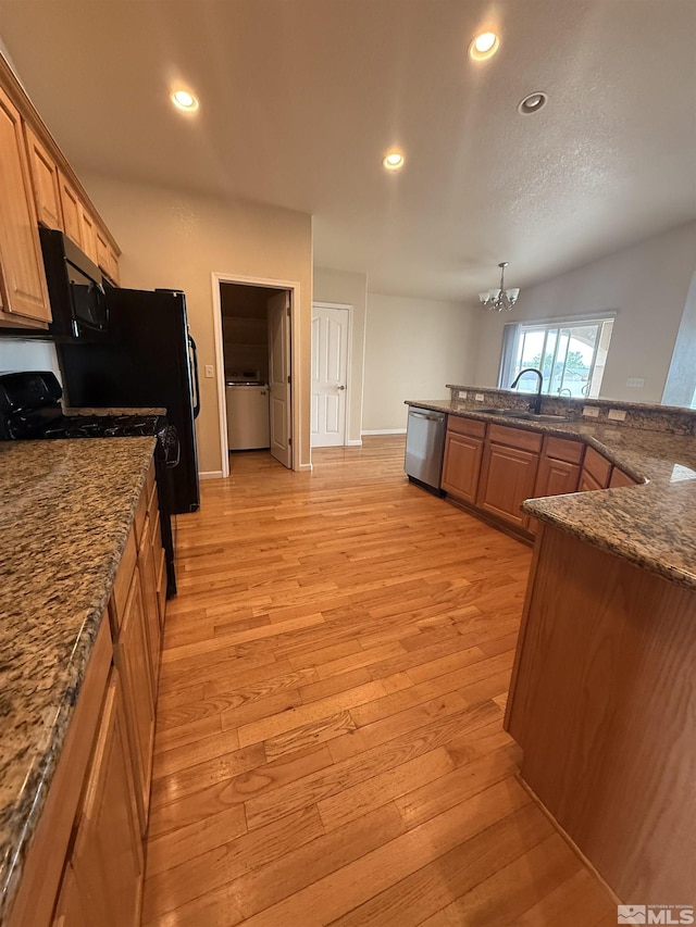 5740 Sarah Rd, Fallon, NV 89406 - kitchen with black appliances, light wood finished floors, a chandelier, a sink, and recessed lighting
