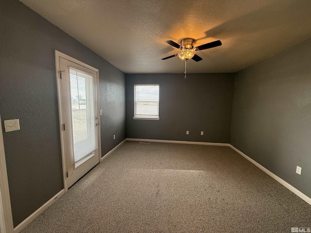 5740 Sarah Rd, Fallon, NV 89406 - carpeted spare room featuring a textured ceiling, a ceiling fan, and baseboards