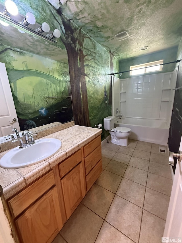 5740 Sarah Rd, Fallon, NV 89406 - bathroom featuring washtub / shower combination, tile patterned flooring, toilet, vanity, and a textured ceiling