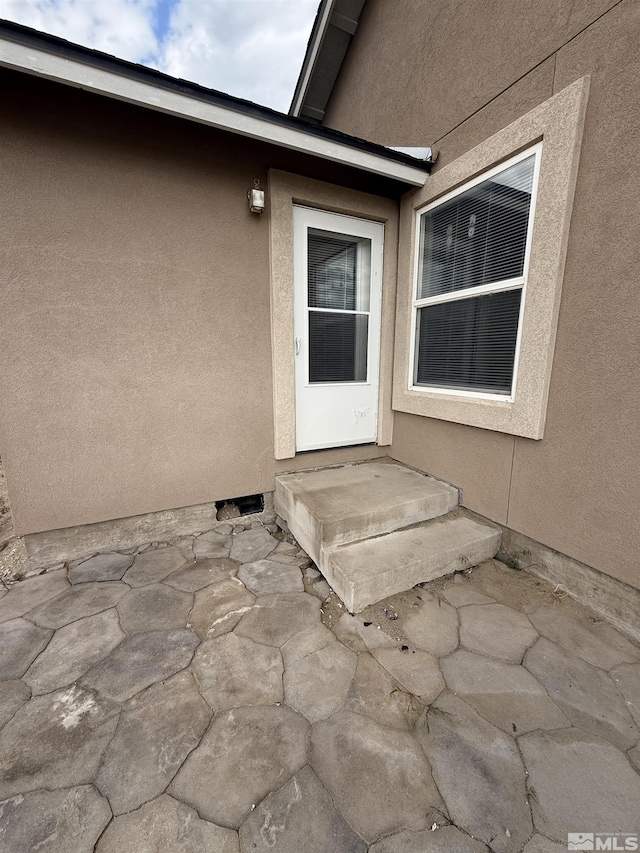 5740 Sarah Rd, Fallon, NV 89406 - property entrance featuring stucco siding