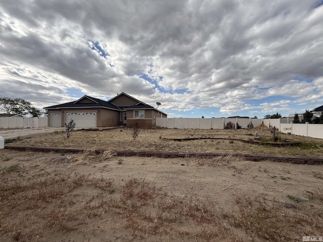 5740 Sarah Rd, Fallon, NV 89406 - view of yard featuring fence and a garage