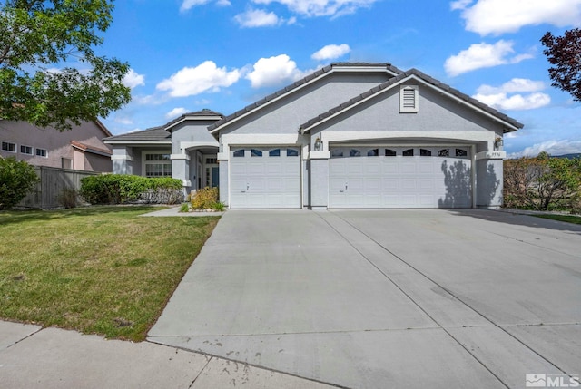 ranch-style home featuring an attached garage, concrete driveway, stucco siding, and a tile roof