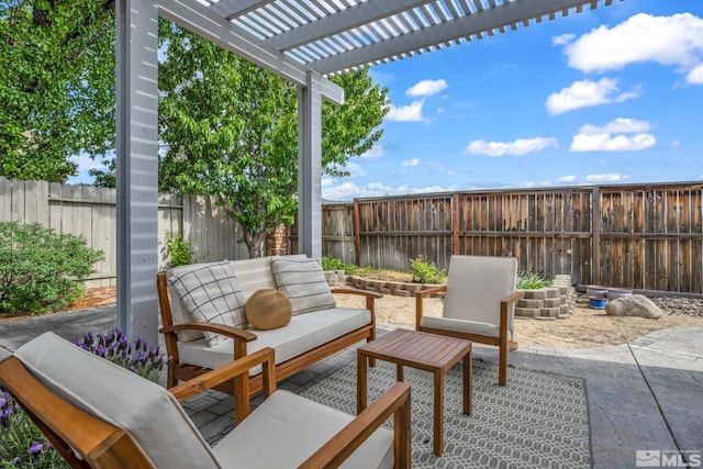 view of patio / terrace featuring a pergola, a fenced backyard, and an outdoor hangout area