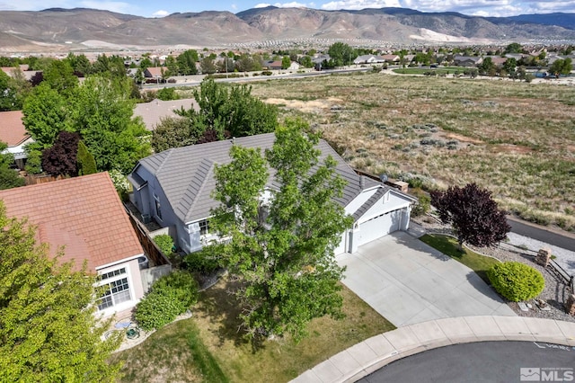 aerial view of residential area with a mountain backdrop