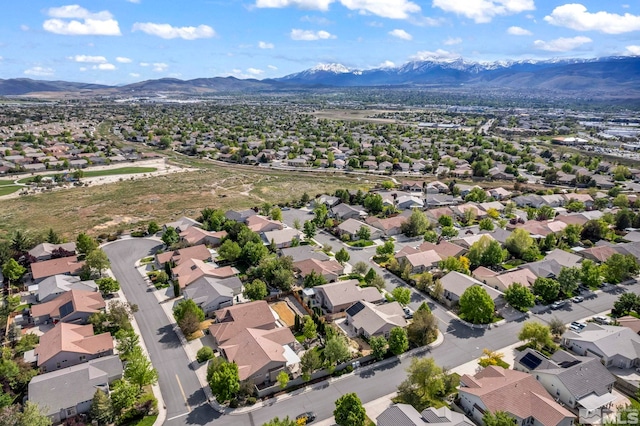 aerial view of residential area with mountains