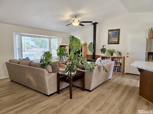 961 Ruddy Ct, Sparks, NV 89441 - living area featuring light wood finished floors, ceiling fan, and lofted ceiling