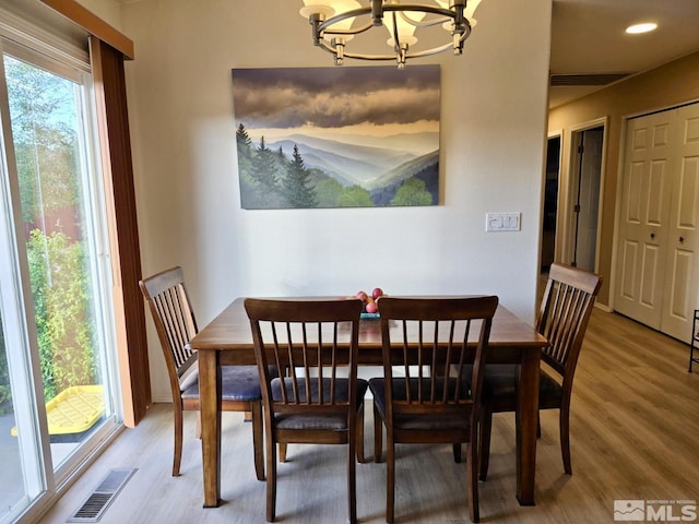 961 Ruddy Ct, Sparks, NV 89441 - dining area with a chandelier, wood finished floors, and recessed lighting