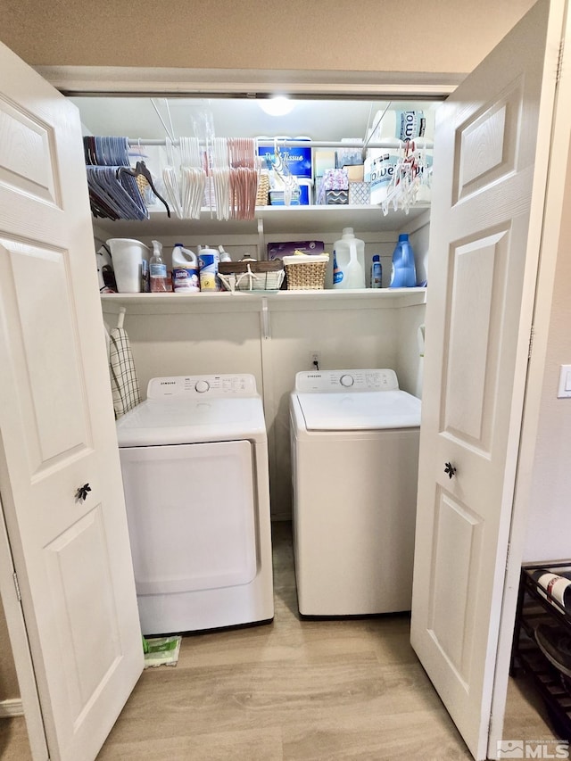 961 Ruddy Ct, Sparks, NV 89441 - laundry room featuring washer and dryer and light wood-style floors
