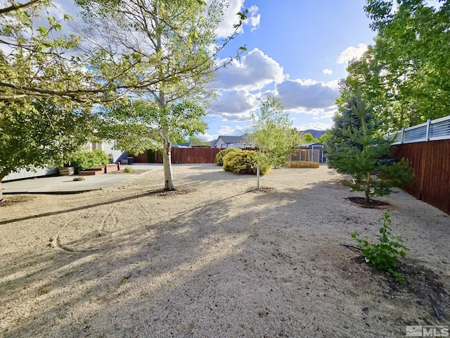 961 Ruddy Ct, Sparks, NV 89441 - view of yard featuring fence and a patio area