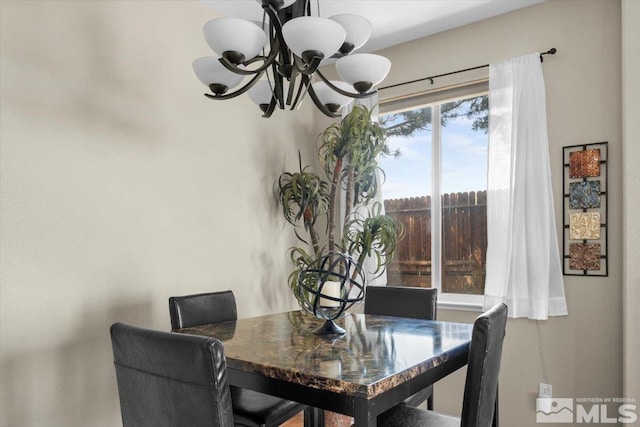 dining room with a chandelier