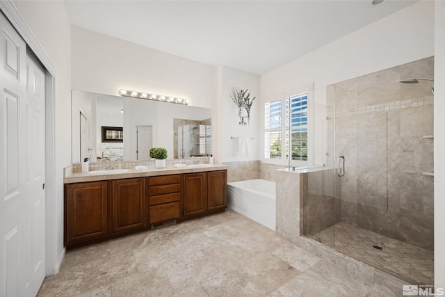6570 Rey Del Sierra Ct, Sparks, NV 89436 - bathroom featuring a shower stall, a garden tub, and double vanity