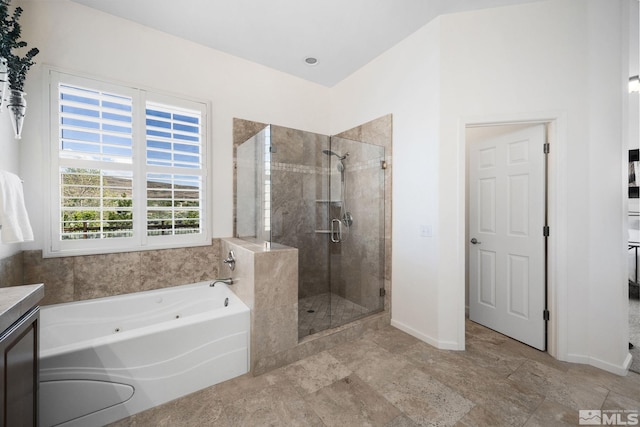 6570 Rey Del Sierra Ct, Sparks, NV 89436 - full bathroom featuring a stall shower, a jetted tub, and baseboards