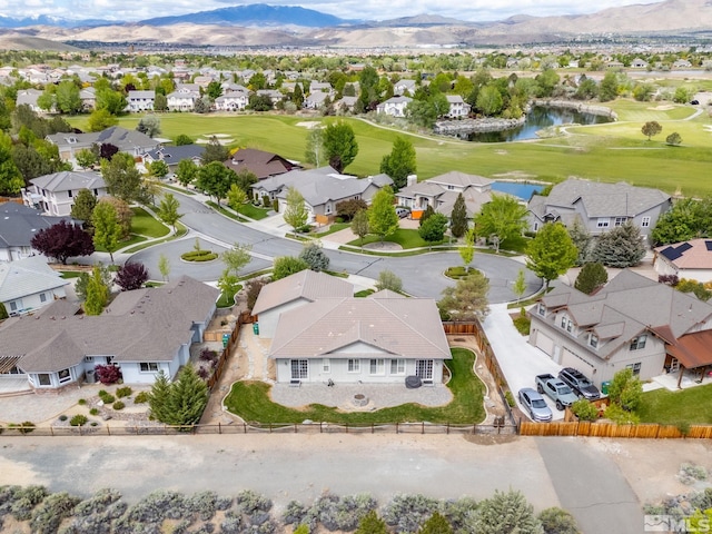 6570 Rey Del Sierra Ct, Sparks, NV 89436 - aerial view of residential area featuring a golf club and a water and mountain view