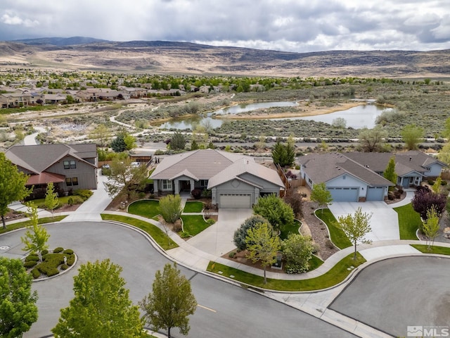 6570 Rey Del Sierra Ct, Sparks, NV 89436 - aerial view of residential area featuring a water and mountain view
