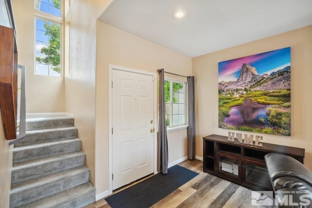 2190 Canyon Mesa Ct, Reno, NV 89523 - foyer entrance featuring wood finished floors, stairway, baseboards, and recessed lighting